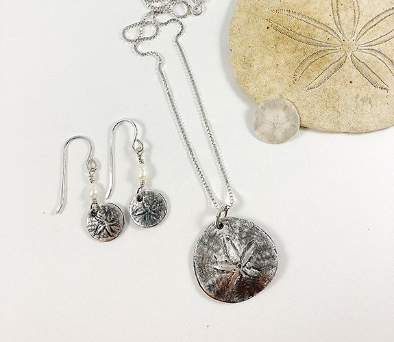 "Pacific Sand Dollar" earrings and necklace - Andi Clarke
